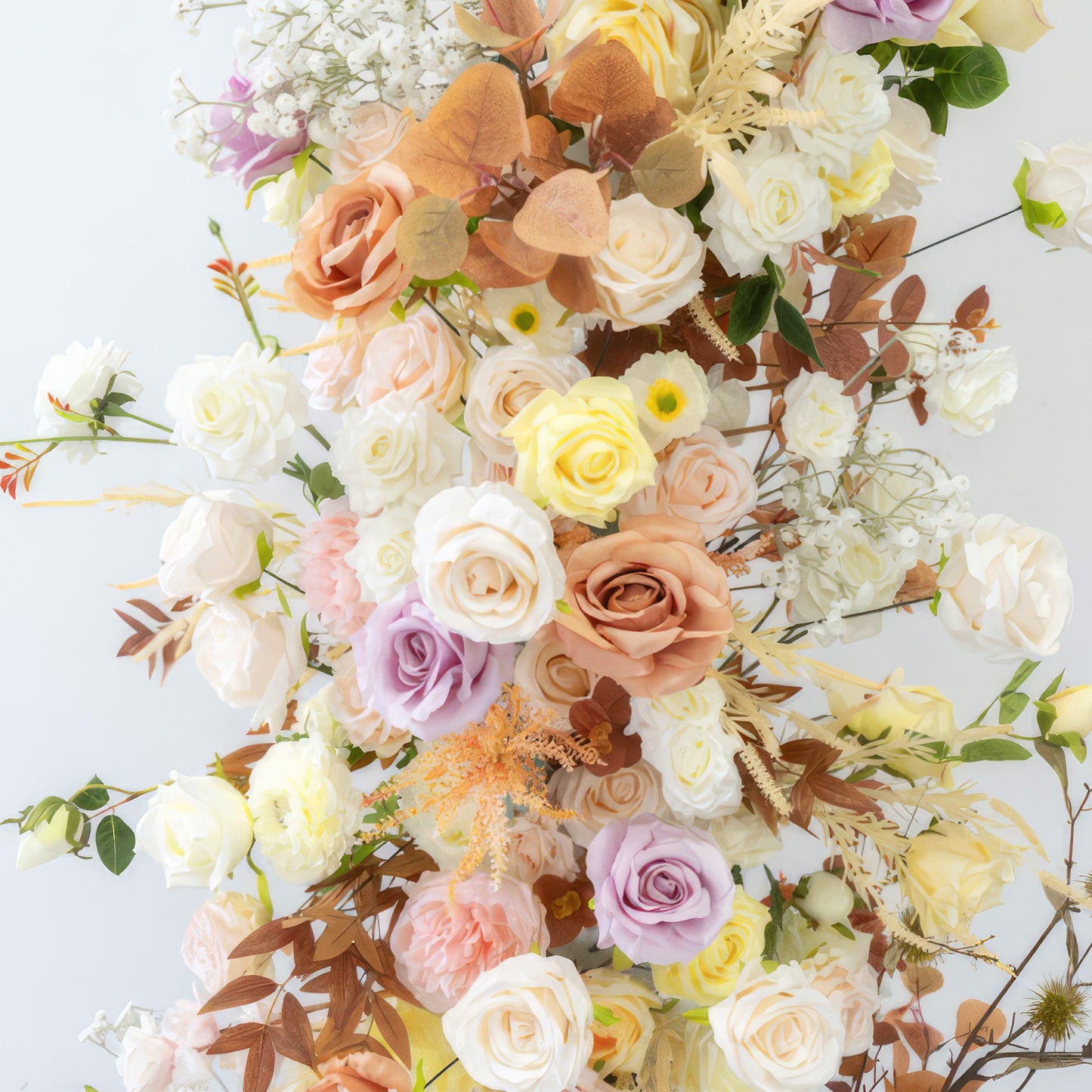 This artificial flower cluster showcases roses in a dreamy palette of pastel pink, lavender, peach, and cream, alongside white blooms. Brown - toned leaves add contrast, creating a soft, romantic, and bohemian style.
