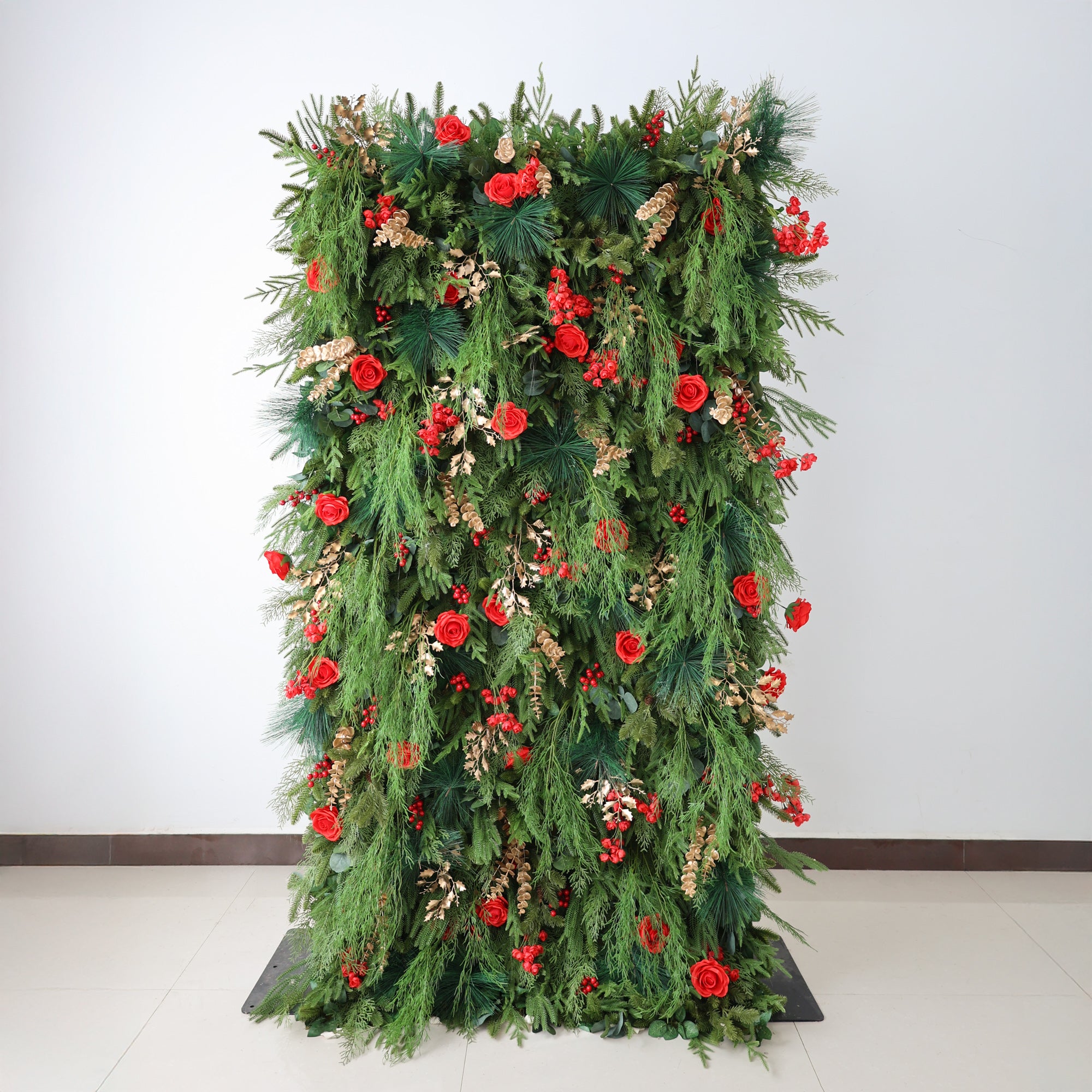 This image showcases a 4x8ft festive floral wall. It is densely adorned with lush green foliage, vibrant red roses, and clusters of red berries. Accents of golden - hued leaves add an elegant touch. The rich, abundant composition exudes a warm, celebratory charm, making it ideal for creating a joyful and inviting atmosphere, perfect for seasonal or event decorations.
