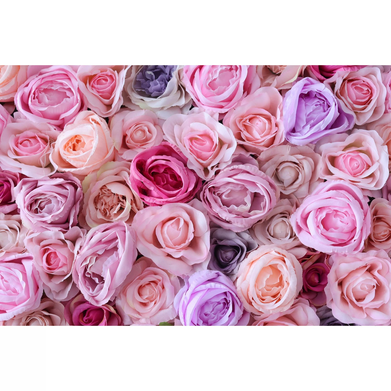 This close - up features a dense cluster of artificial roses in soft pink, peach, lavender, and deeper pink hues. The petals&