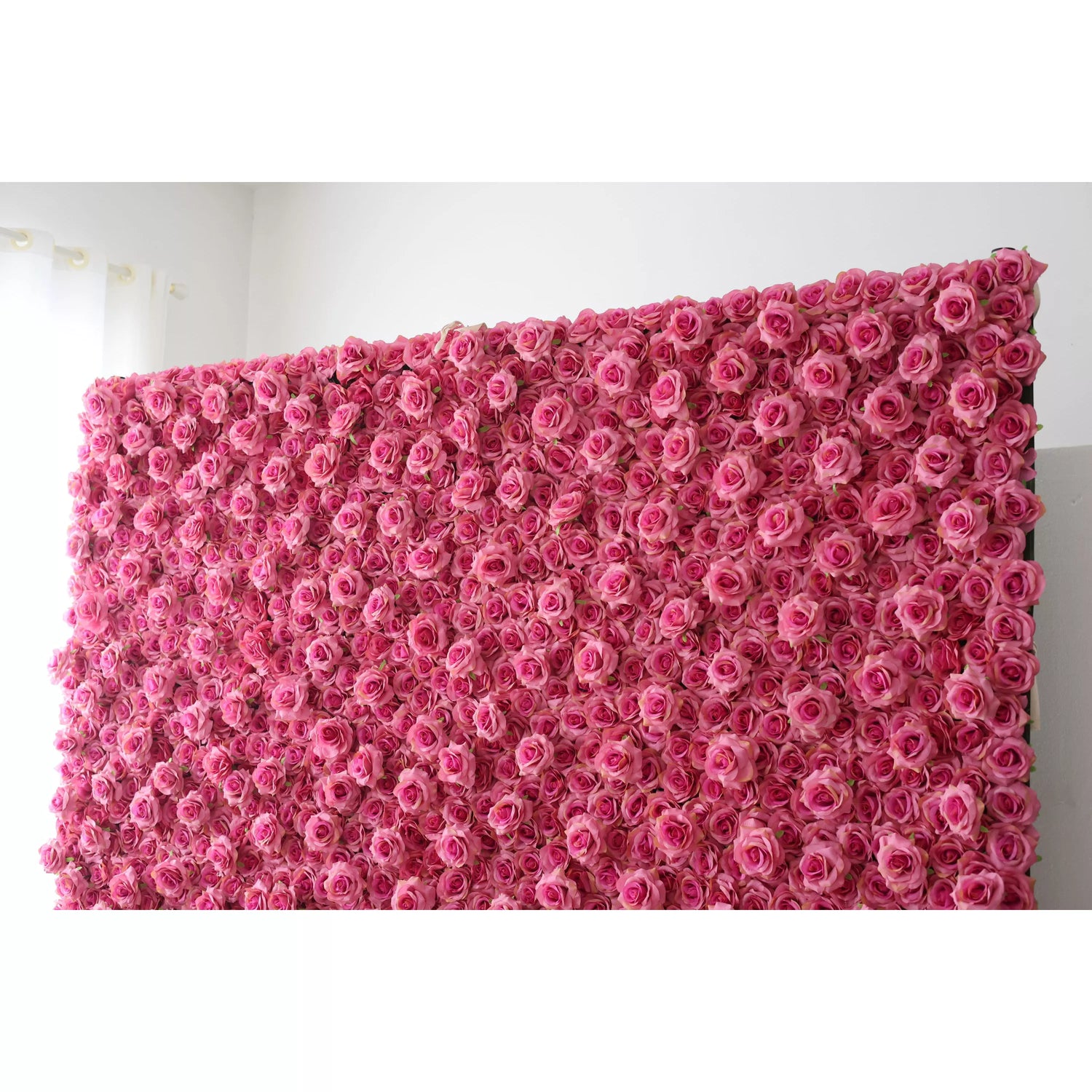 This large artificial flower wall is densely packed with soft - pink roses. The uniform, lush arrangement creates a romantic and gentle atmosphere. Ideal as a backdrop for weddings, events, or photo shoots, it adds an elegant, dreamy touch, filling the space with a sweet, feminine charm.