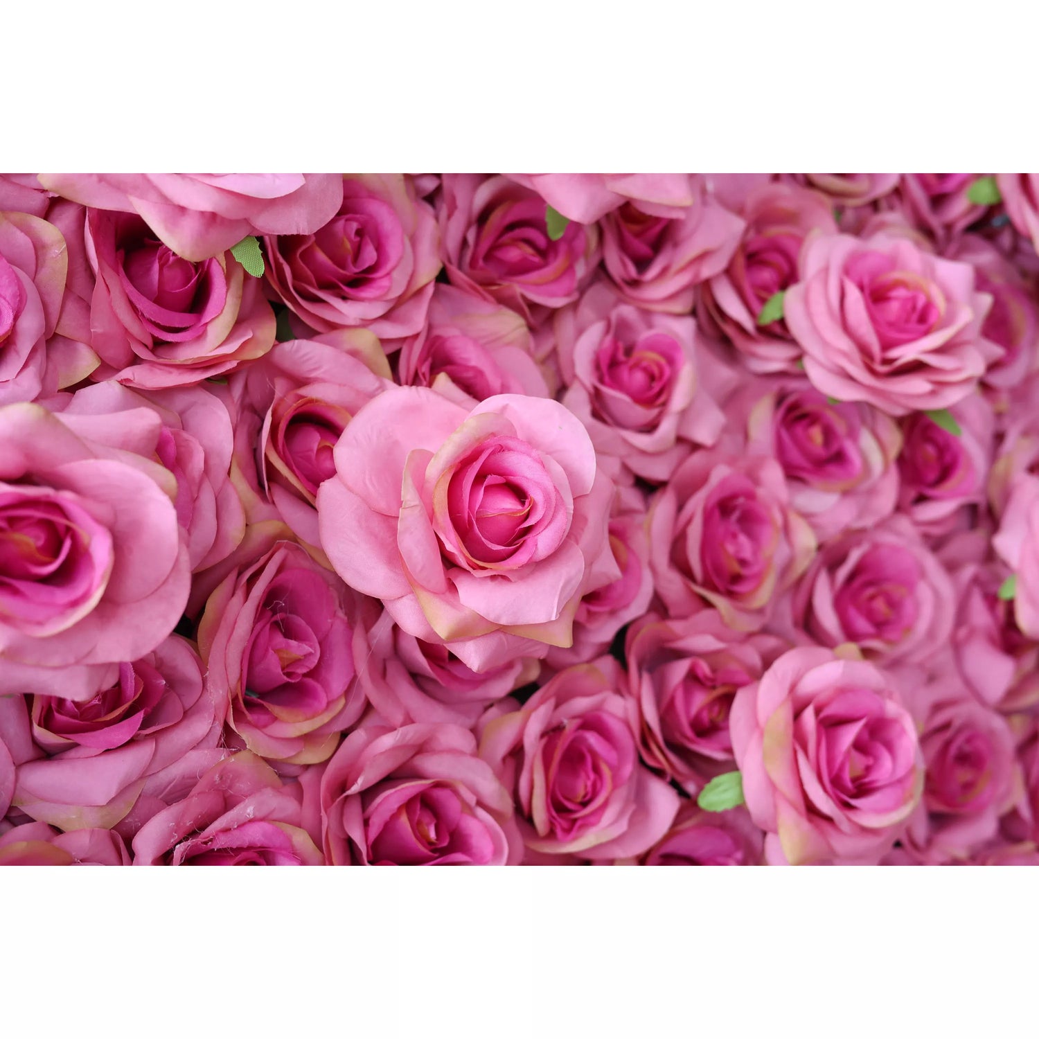 This close - up shows a dense cluster of artificial pink roses. The soft pink petals, with subtle color gradients, create a romantic and delicate look. Ideal for decor, they bring an elegant, dreamy vibe, perfect for adding a touch of sweetness to backdrops or floral arrangements.