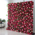 This picture features a large artificial flower wall, a vibrant mix of deep red blossoms and soft pink roses, interspersed with green leaves. The dense, lush arrangement creates a romantic and eye - catching display, perfect for event backdrops. The contrasting colors and natural - looking foliage add an elegant, decorative touch, ideal for weddings or parties to create a dreamy atmosphere. A small plant on the side complements the scene.