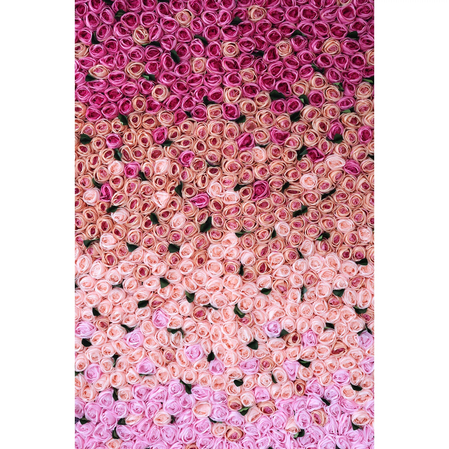 This close - up shows a large artificial flower wall, a beautiful gradient of pink tones. It’s densely packed with rose - like blooms, transitioning from deep pink at the top to soft pink at the bottom. The uniform, lush arrangement creates a romantic, eye - catching display, perfect for event backdrops. The vibrant colors and dense floral pattern add a touch of elegance and charm, making it an ideal decorative element for weddings or parties.