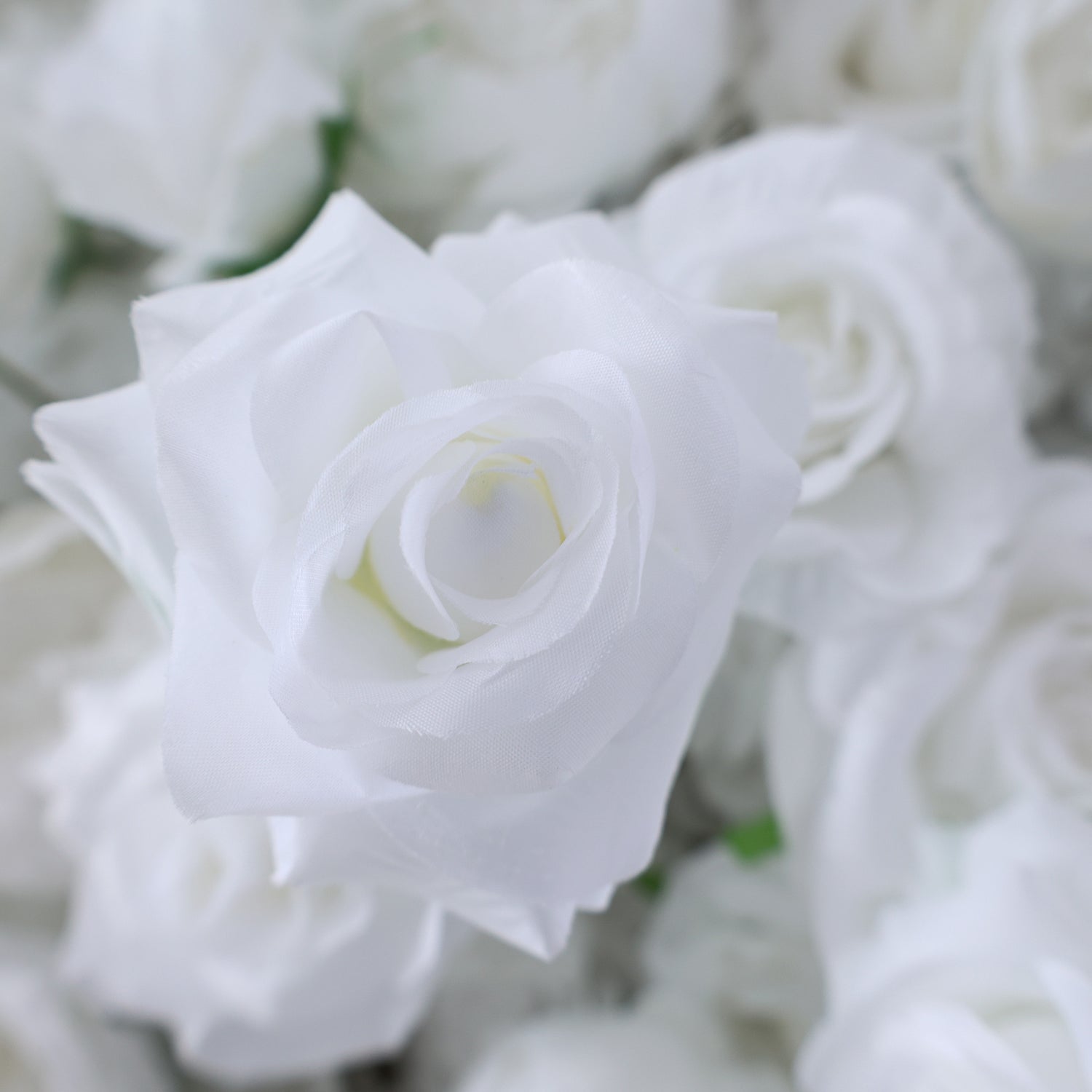 This picture features a close - up of a white artificial rose. The petals are soft and smooth, with a pristine white hue that gives a sense of purity. The rose&