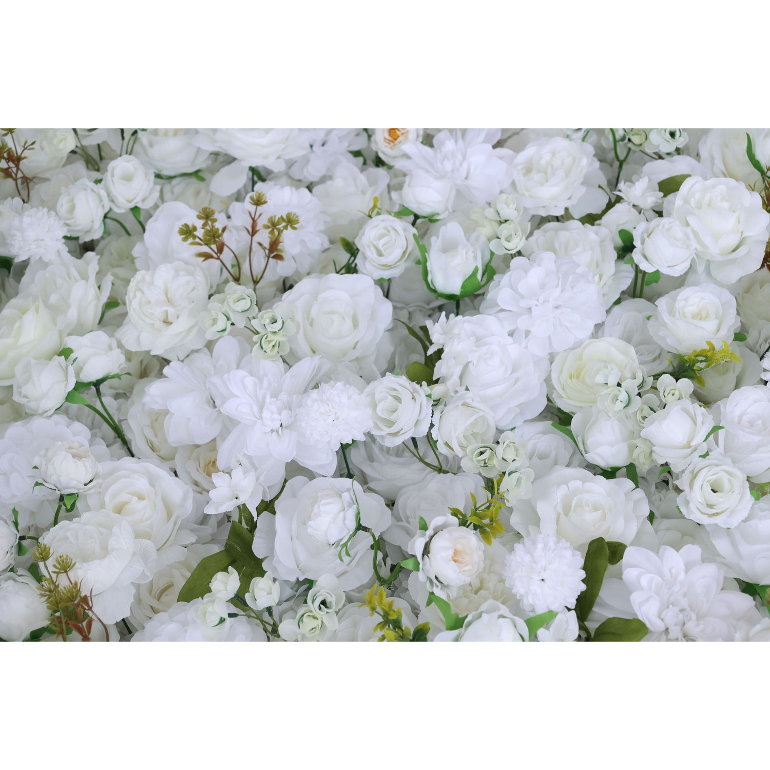 This backdrop is densely filled with artificial white flowers, mainly roses and some other blossoms, accompanied by green leaves. The all - white color scheme presents a sense of elegance and purity. It&