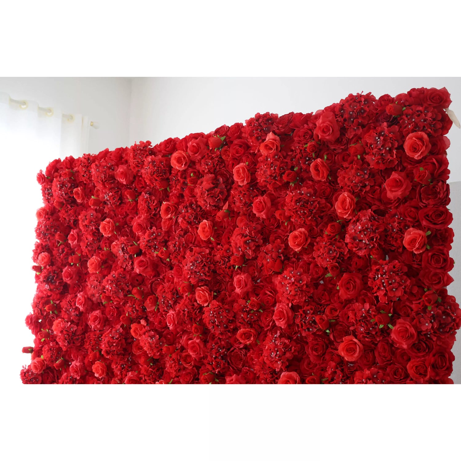 This flower wall is a striking display of artificial red blooms. It blends roses and clustered flowers, creating a rich, layered texture. The deep red hue exudes passion and elegance, making it perfect for weddings, events, or as a bold decor statement. A vibrant, eye - catching backdrop full of romance.