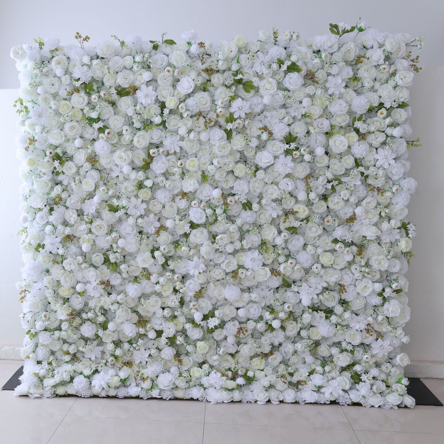 This backdrop features a profusion of artificial white roses and other blooms, with green leaves adding a fresh touch. The all - white color palette exudes elegance and purity. It&