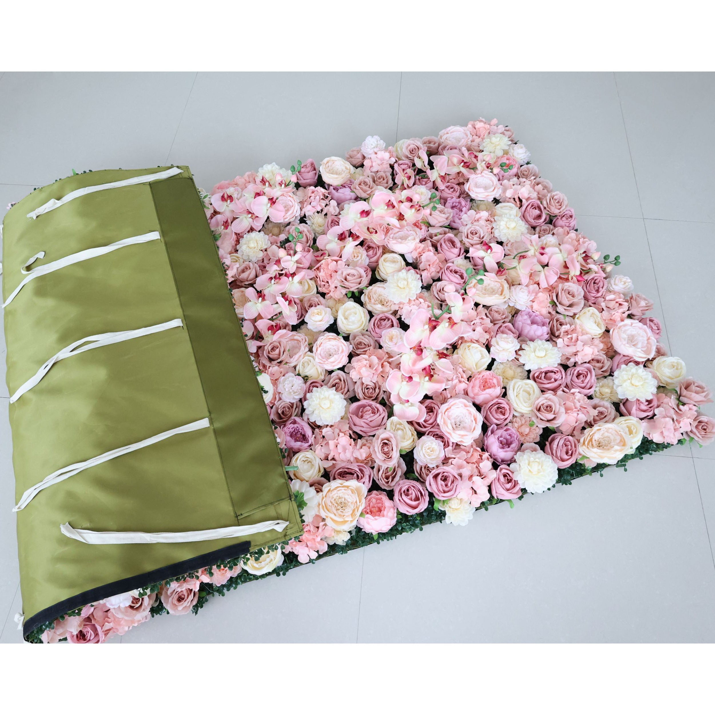 This is a 4x8ft (1.2x2.4m) Valar Flowers premium blush pink artificial flower wall panel, showcasing a lush, dense arrangement of lifelike roses, orchids, and carnations in soft pink, champagne, and ivory tones, with a durable green fabric backing and reinforced tie straps for easy installation. High-quality, hyper-realistic petals deliver an elegant, romantic, maintenance-free aesthetic, perfect for wedding backdrops, photo booths, and luxury event styling, offering reusable, portable, long-lasting beauty.