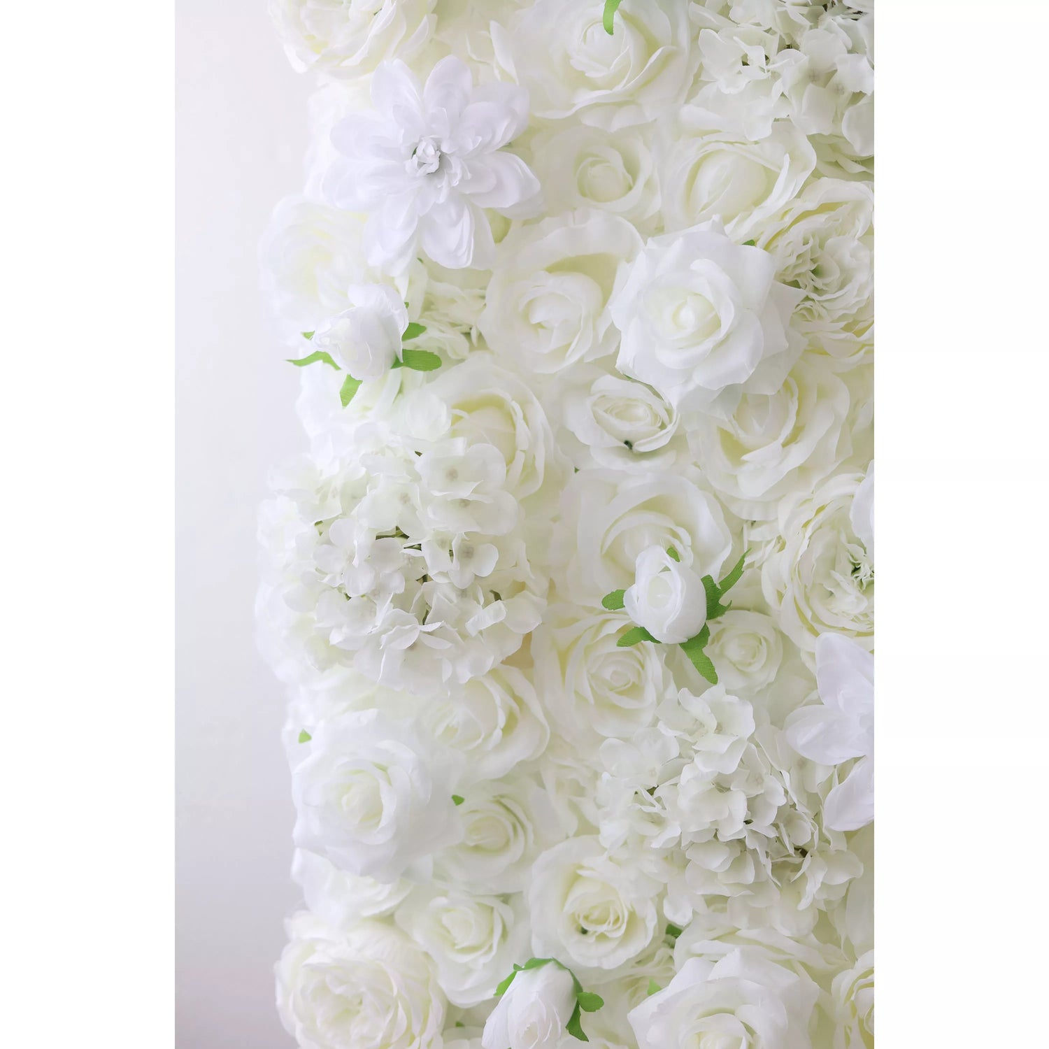 This flower wall is a lavish display of white artificial blooms. It blends roses, delicate flowers, and hydrangea - like blossoms, with tiny green leaves adding contrast. The dense, layered arrangement creates a soft, romantic texture, perfect for weddings or elegant events, exuding purity and sophistication.