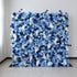 This image showcases a large, dense floral wall indoors. It&