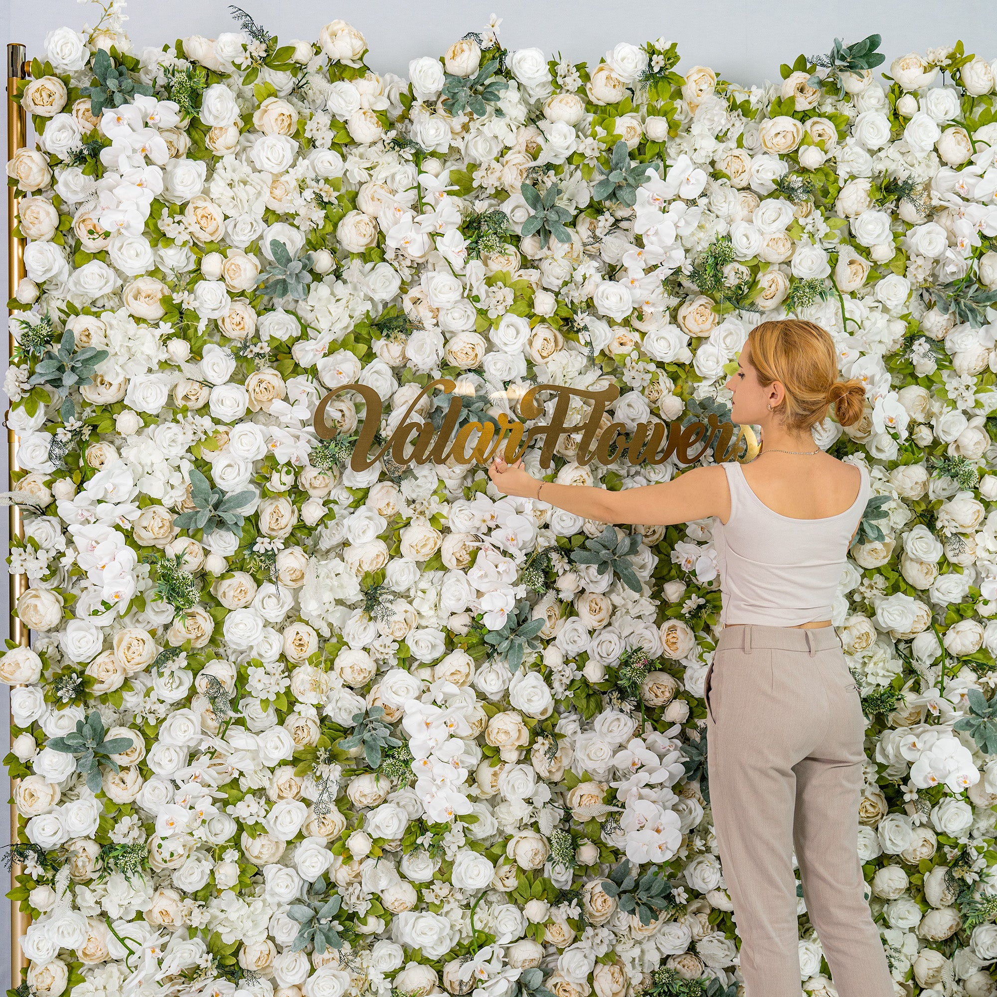 This backdrop features a lush arrangement of white roses, peonies, and orchids with green foliage. The white - green color theme exudes elegance, making it perfect for weddings, galas, or upscale events. The “Valar Flowers” sign adds a branded touch.