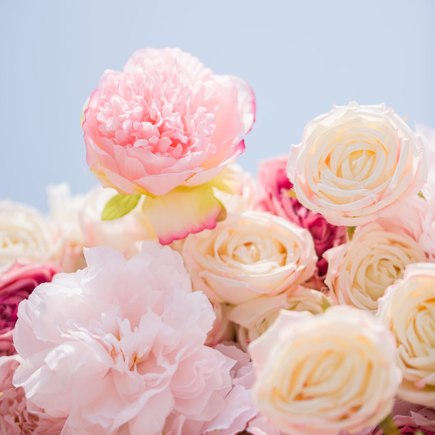 This photo from ValarFlowers showcases a close - up of a beautiful floral arrangement. It features large, lush pink peonies and soft - hued roses in shades of cream and pale pink. The delicate petals and soft colors create a romantic and elegant look. Ideal for events like weddings, anniversary celebrations, or a “Blushing Romance” - themed party, these flowers add a touch of timeless beauty and charm.