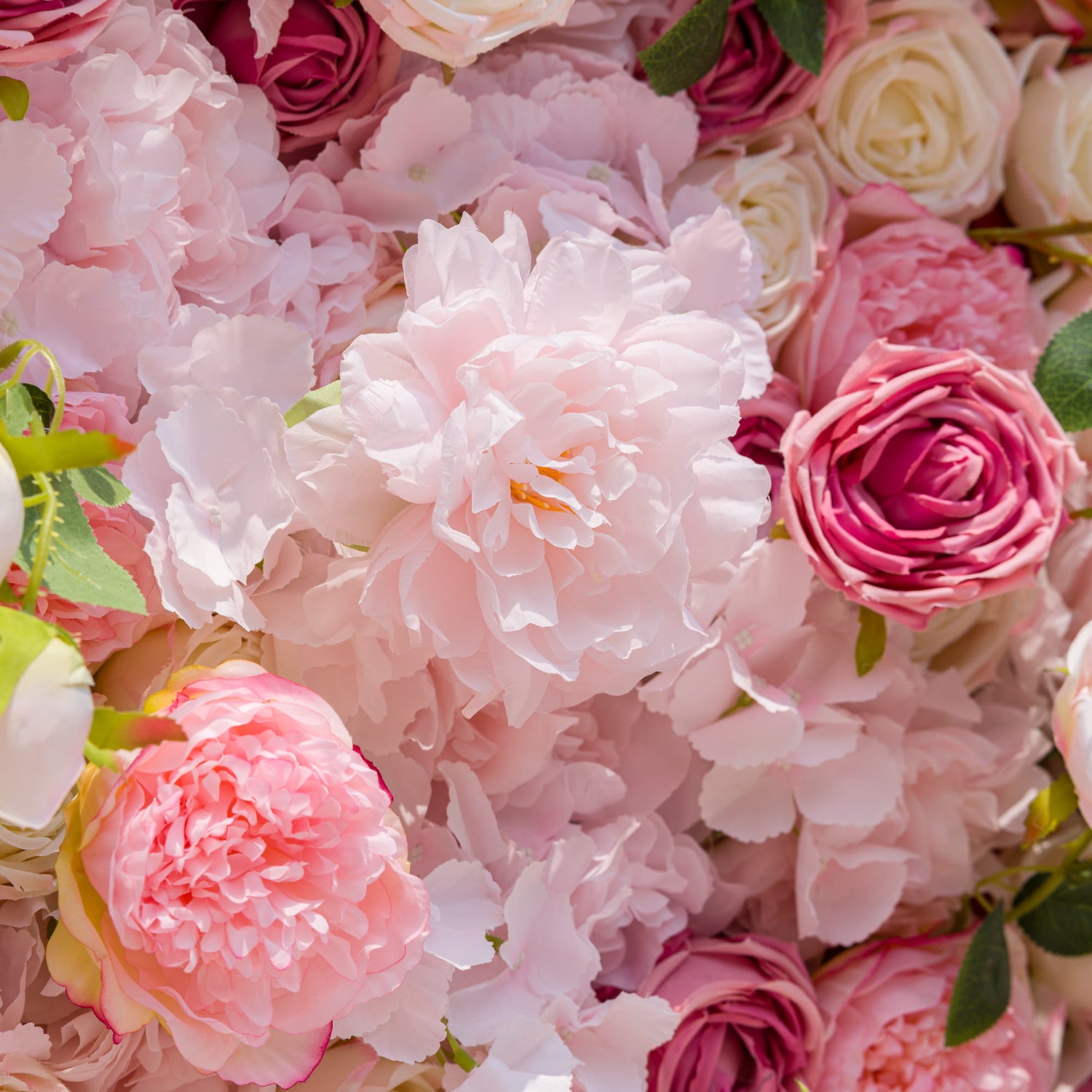 This photo from ValarFlowers features a dense arrangement of roses and peonies in soft pink and cream tones. The full, velvety petals of the peonies and the classic elegance of the roses create a romantic and luxurious look. Ideal for weddings, bridal showers, or high - end anniversary events, these flowers bring an air of grace and charm, perfect for celebrations centered around love and beauty.