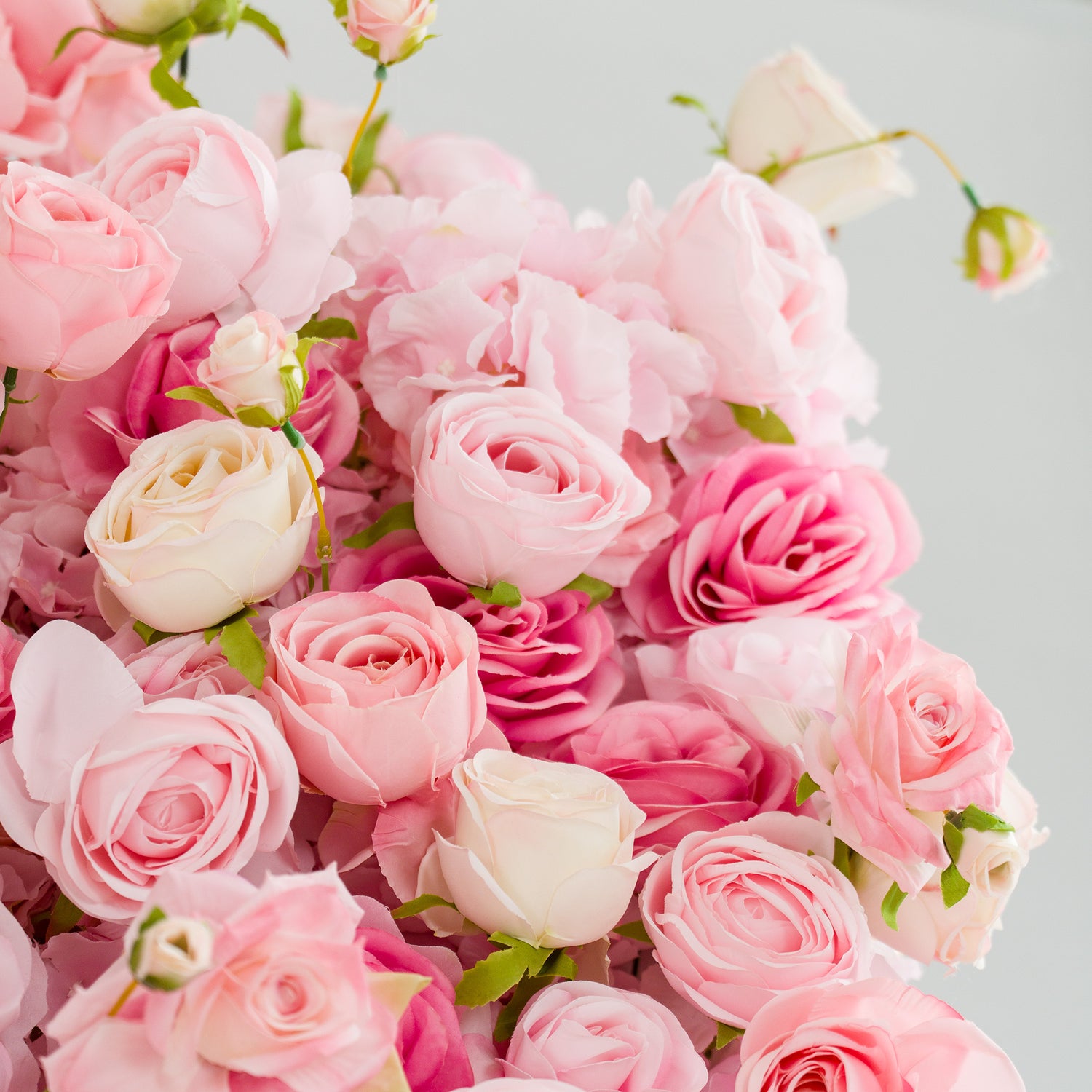 This photo from ValarFlowers showcases a lush bouquet of roses. It prominently features Royal Roses in various shades of soft pink and creamy white. The delicate petals and lush green leaves create a romantic and elegant atmosphere. Ideal for weddings, anniversaries, or other romantic occasions, this arrangement exudes charm and sophistication, embodying ValarFlowers&