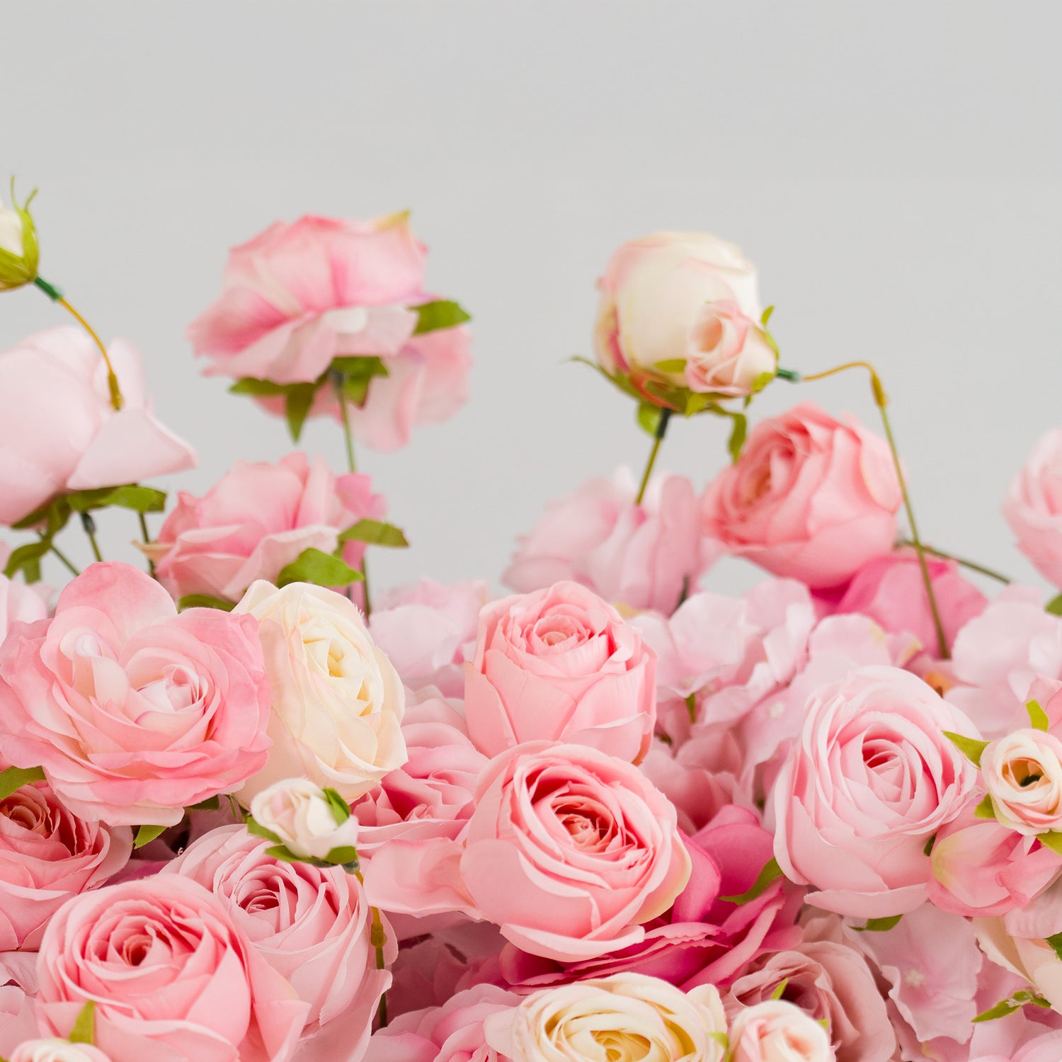 This photo from ValarFlowers showcases a beautiful arrangement of roses in soft pink and white hues. The roses, with their delicate petals and lush green stems, create a romantic and elegant display. Ideal for weddings, bridal showers, or anniversary celebrations, these flowers add a touch of charm and sophistication. ValarFlowers&