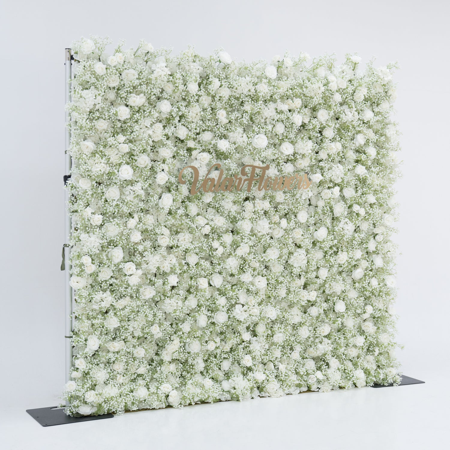 This image features a large, square floral wall densely covered with white flowers, including baby&