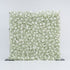This image features a large, square floral wall densely covered with white flowers, including baby&
