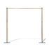 This image features an adjustable - size golden backdrop stand. It consists of two vertical poles connected by a horizontal bar at the top. The vertical poles have adjustable sections, indicated by the presence of connectors, which allow for height modification. The stand is supported by flat, rectangular base plates, providing stability. The golden finish gives it an elegant appearance, making it suitable for events like weddings or photography setups.