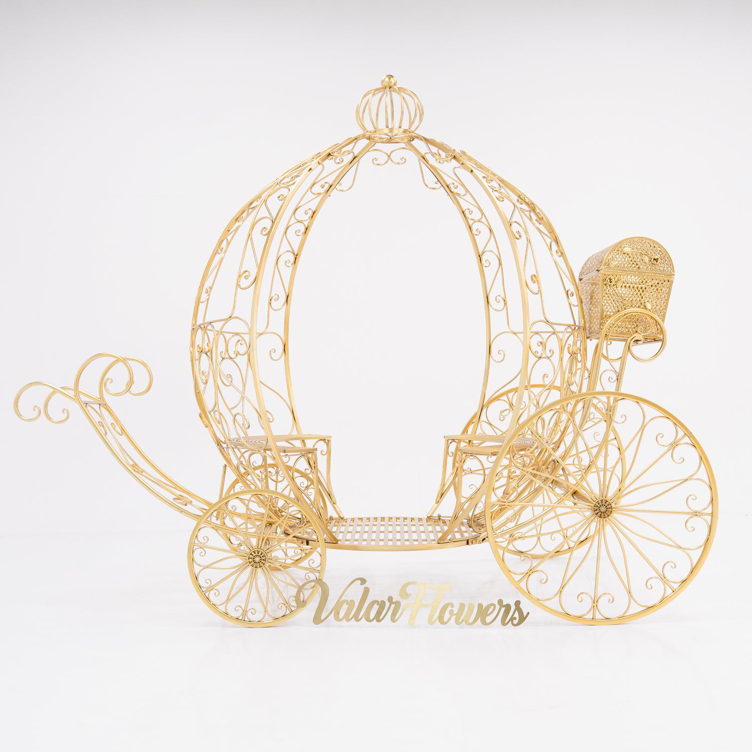 A 7.9ft life - size, Disney - style Cinderella’s fantasy pumpkin carriage. Crafted from gold - toned, ornate wrought iron with intricate scrollwork. Features a curved, open - air design, large decorative wheels, and a small attached compartment. “ValarFlowers” adds a branded touch, perfect for fairy - tale - themed events.