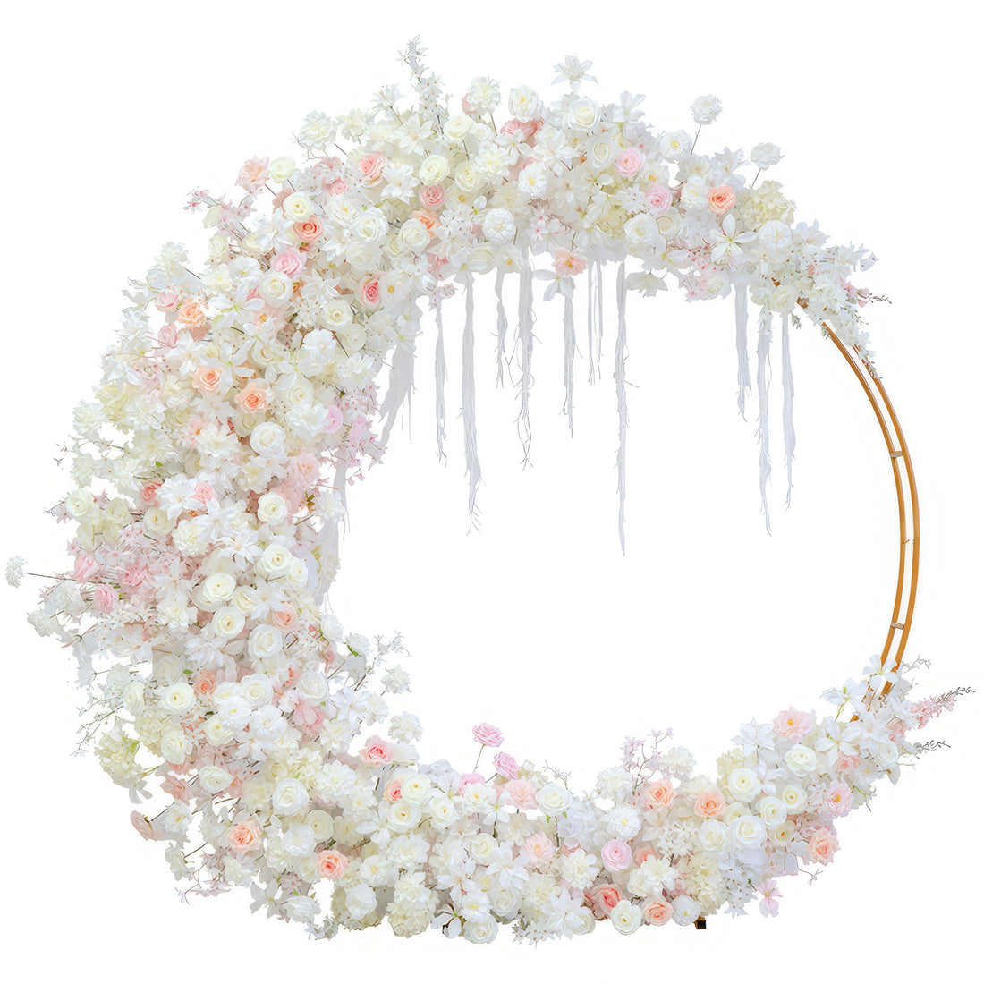 The image displays a circular floral arch made of artificial flowers. Colors are mainly white, with touches of light pink and peach. It features roses and small blossoms. The style is delicate and dreamy, ideal for romantic events. 