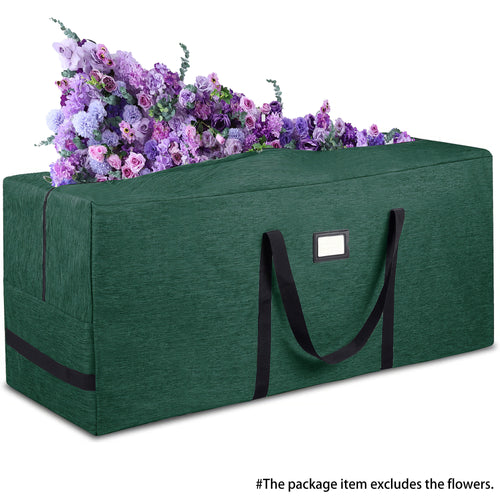 This image shows a large, dark green storage bag with black handles and a rectangular label patch on its side. The bag appears to be made of a durable fabric, likely for carrying or storing items. At the top of the bag, there is a display of colorful artificial flowers in various shades of purple and pink. Notably, a caption at the bottom indicates that “The package item excludes the flowers,” clarifying that the flowers are not part of what is being sold. 