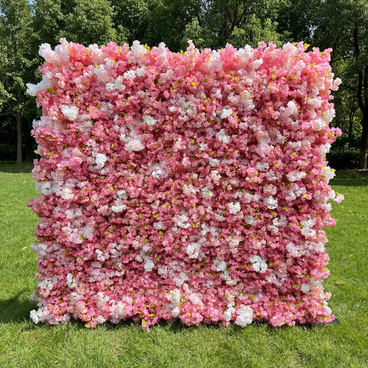 Valar Flowers premium artificial cherry blossom flower wall backdrop, a dense, lush floral panel in gradient pink and white blooms. Perfect for outdoor weddings, spring events, bridal showers, photo booths, and garden parties, this lifelike cherry blossom wall delivers a dreamy, romantic, ethereal aesthetic.