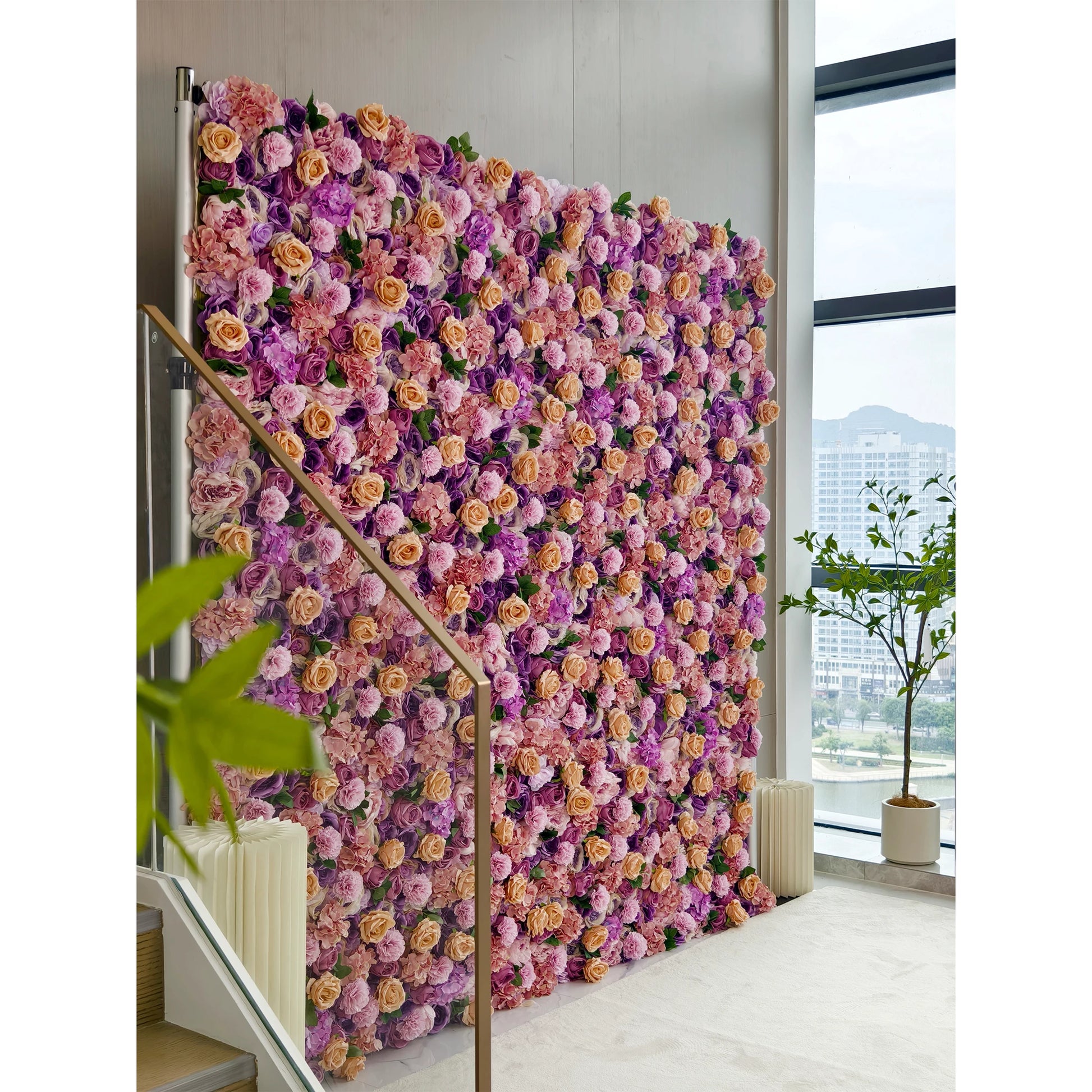 This flower wall is a large - scale, lush arrangement of artificial flowers. It combines purple, pink, and peach - colored blooms, creating a vibrant and romantic gradient. Ideal for decorative backdrops in events like weddings or photo - shoots, it adds an elegant and charming atmosphere to the space. 