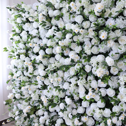 This image displays a dense arrangement of artificial white flowers, mainly roses, interspersed with lush green leaves. The flowers create a rich, elegant tapestry, exuding purity and charm. Perfect for decorative use in events or as an eye - catching interior backdrop, the scene blends pristine white hues and natural - looking foliage to form a visually appealing floral display.