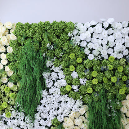 This image showcases a lush artificial floral wall. It features a dense arrangement of various flowers, including abundant white roses, creamy - hued blooms, and assorted white and green foliage. Trailing green vines add a natural touch. The harmonious blend of white, cream, and green creates a vibrant, elegant, and refreshing display, perfect for decorative purposes in events or as an interior backdrop, exuding a sense of natural beauty and artistry.