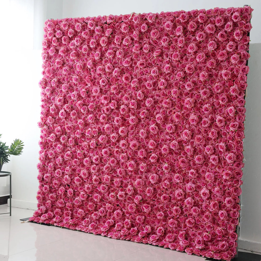 This large artificial flower wall is covered with dense, uniform pink roses. The soft pink hue creates a romantic and gentle atmosphere. It serves as an eye - catching backdrop, ideal for events like weddings or photo shoots, adding an elegant and dreamy touch to the space.