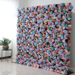 This large artificial flower wall bursts with colors—blue hydrangeas, purple roses, peach blooms, and greenery. Densely packed, it creates a lush, vibrant display. Perfect for events, it brings a cheerful, romantic vibe, adding an eye - catching, decorative charm to the space. 