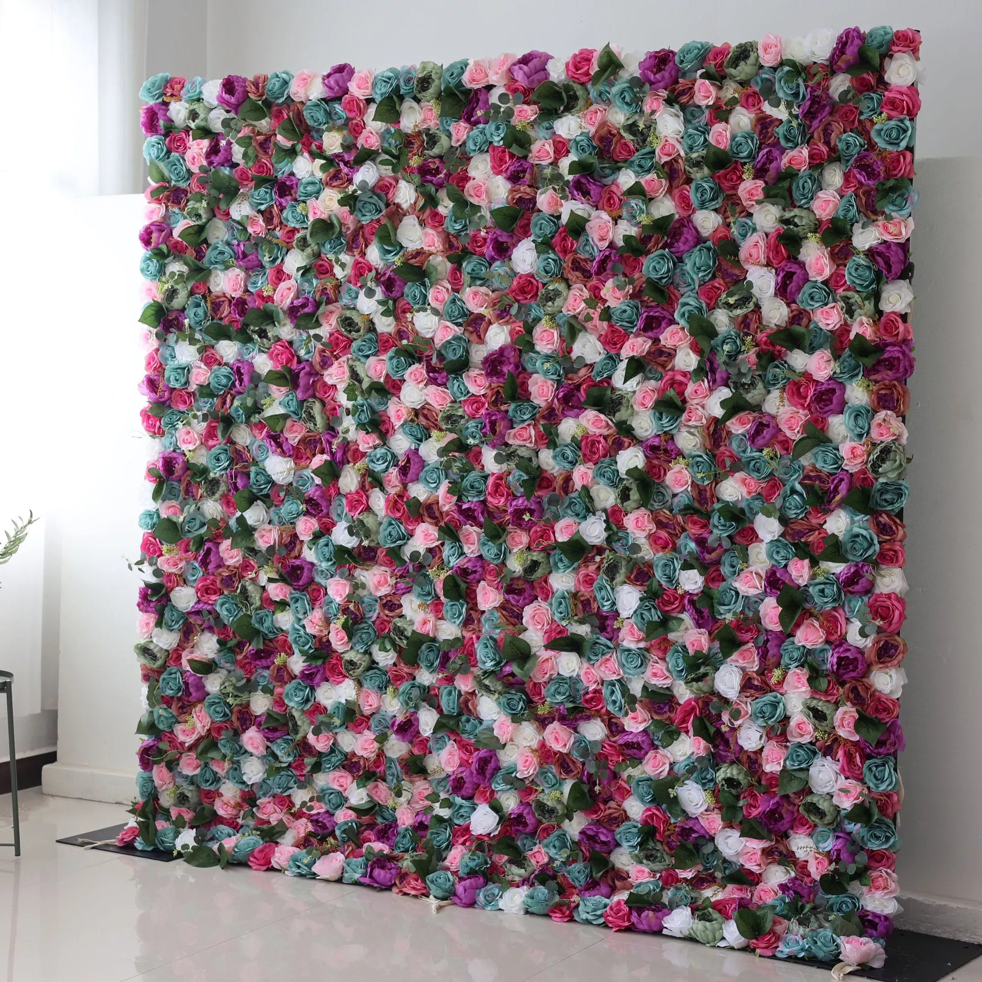 Valar Flowers' Enchanted Garden: This large artificial flower wall is a vibrant tapestry of colors. It features an array of blooms—pink, purple, white, and teal—interspersed with green foliage. The dense, intricate arrangement creates a lush, eye - catching display, perfect for adding a romantic, decorative touch to events or spaces. 