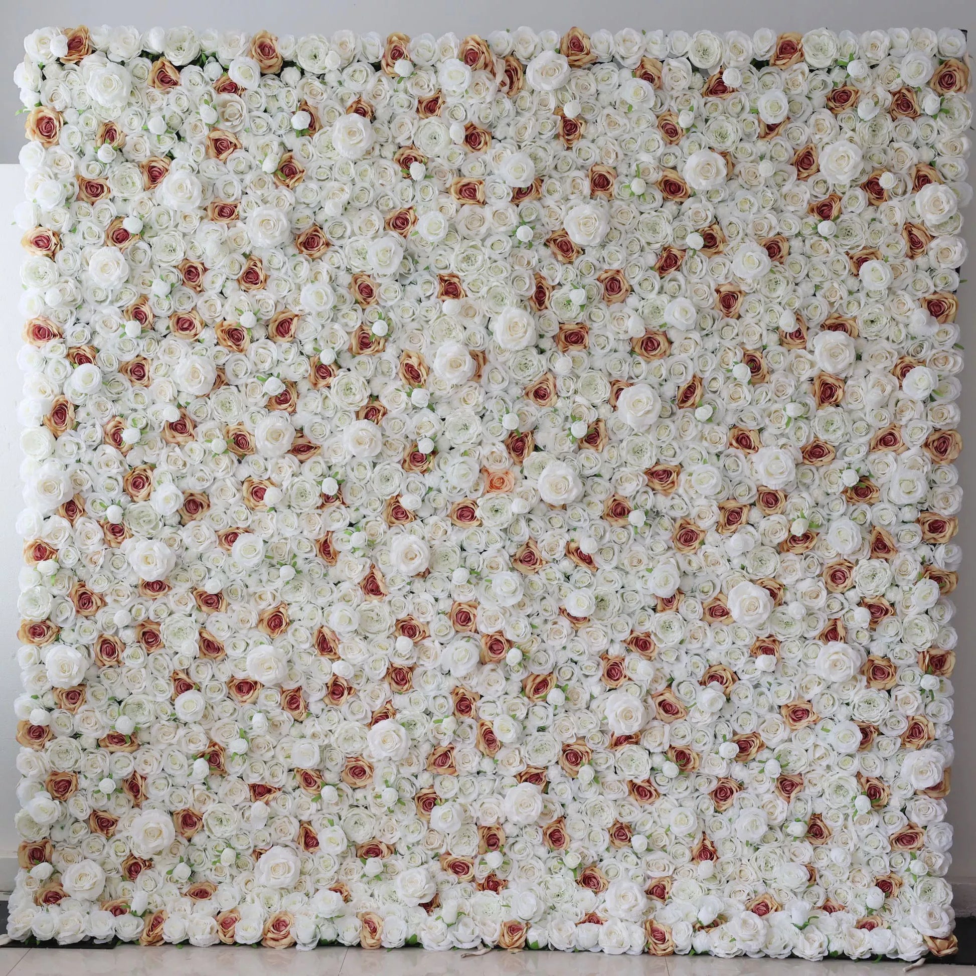 A massive artificial flower wall showcases a dense arrangement of white roses, each with a charming brown - edged center. The uniform, lush blooms create a sophisticated, elegant, and romantic backdrop, ideal for adding a touch of refinement to events like weddings or photo shoots. 