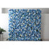 A large artificial flower wall features a lush arrangement of blue blooms, including roses, hydrangeas, and small white flowers. Accents of yellow pom - pom - like flowers and green foliage add texture. The harmonious blend of colors creates a vibrant, elegant backdrop, perfect for events or decorative spaces, exuding a sense of freshness and beauty. 
