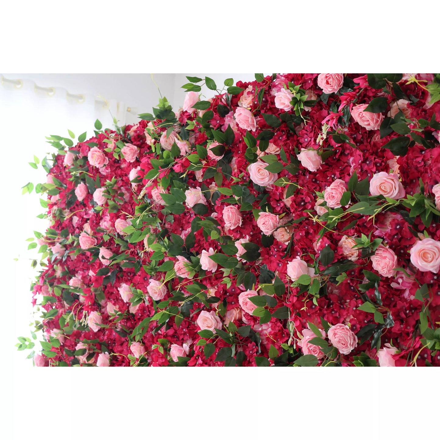 This is a lush artificial flower wall. It features a vibrant mix of deep - red blossoms and soft - pink roses, interspersed with green leaves. The dense, cascading arrangement creates a romantic and eye - catching display, perfect for event backdrops. Ideal for weddings or parties, it adds an elegant, natural - looking touch to the space. 