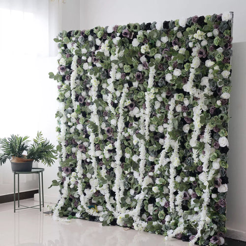 This is a large artificial flower wall with a lush, green - based color scheme. It features white flowers, purple roses, and green foliage, creating a dense, natural - looking display. Paired with potted plants on the side, it adds an elegant, verdant touch, perfect for decorative event backdrops. 