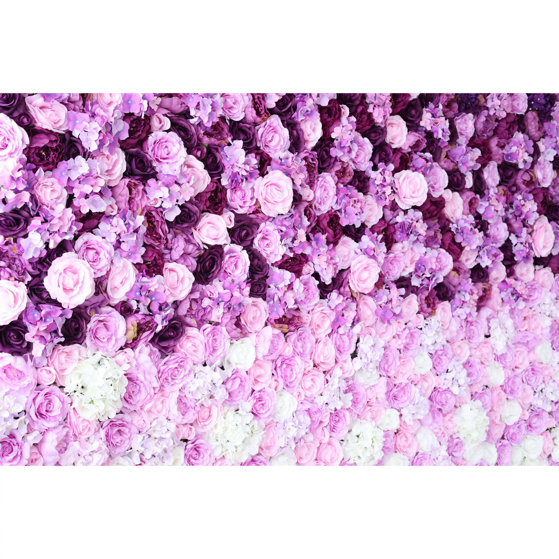 This flower wall is a captivating blend of purple and pink artificial roses, plus delicate flowers. Dense, overlapping blooms create a lush, romantic texture. Subtle color gradients and varied petal shapes add depth, making it perfect for weddings or events. It exudes elegance and charm as a dreamy backdrop.