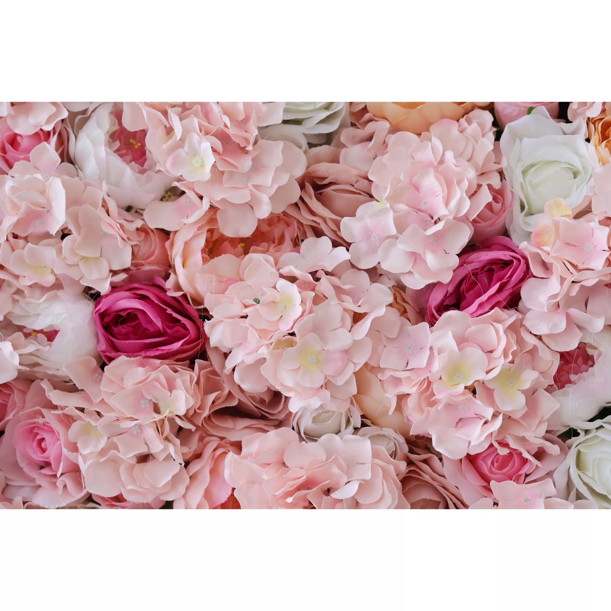 This close - up image showcases a dense arrangement of artificial flowers. Predominantly in soft shades of pink, it features delicate hydrangeas and roses. There are also some deeper pink roses interspersed, adding contrast. The lush and vibrant floral display is perfect for creating a romantic and elegant atmosphere, often used in event decorations like weddings or photo booth backdrops. 