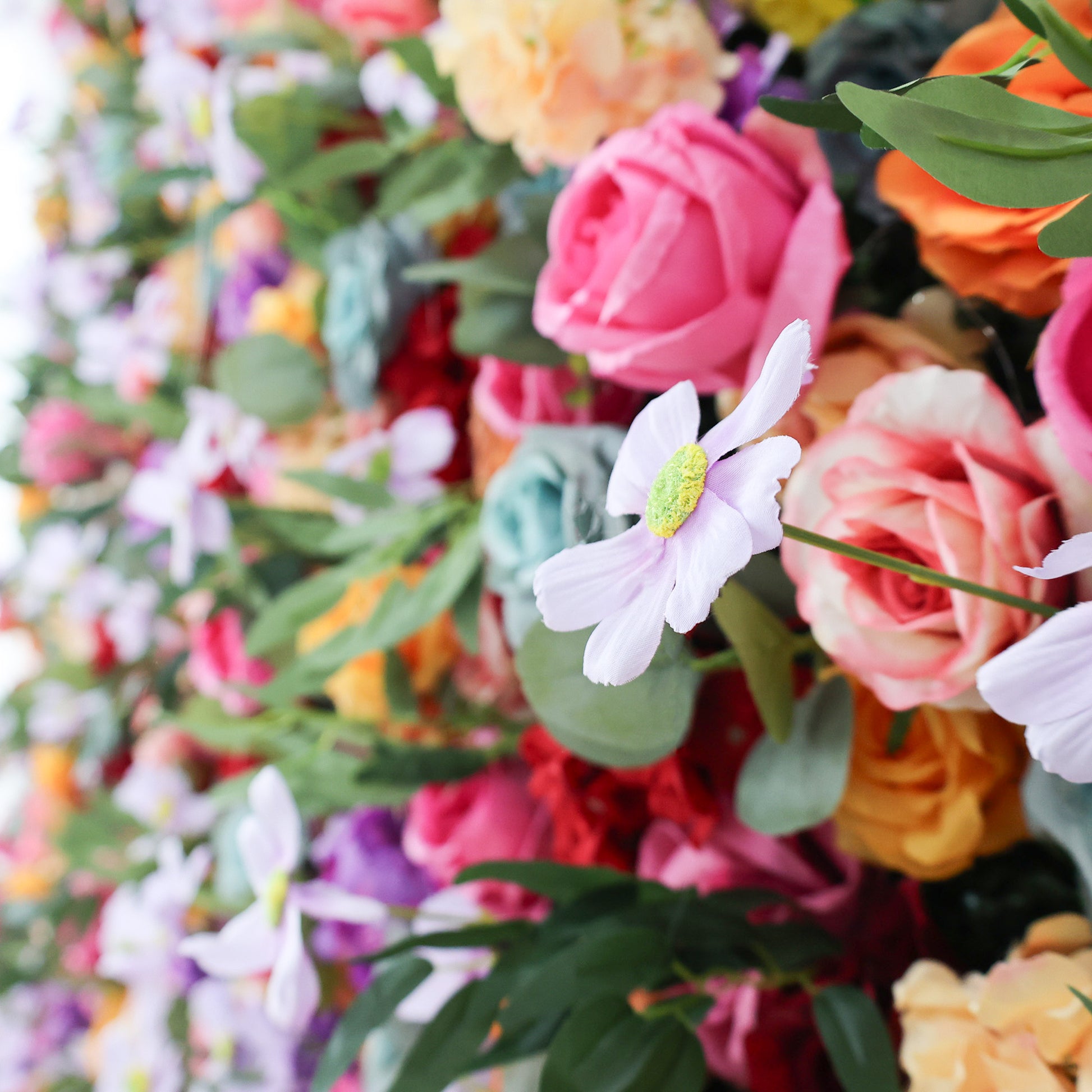 ValarFlowers vibrant rainbow flower wall backdrop with lush roses peonies hydrangeas for wedding party photo booth