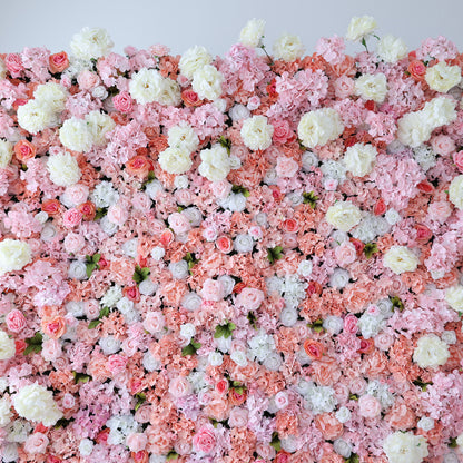 This image showcases a lush floral backdrop by ValarFlowers, with a dense arrangement of artificial flowers in shades of pink, peach, and white. The textured display exudes elegance, perfect for adding a luxurious, nature-inspired element to events or interiors, highlighting the brand’s craftsmanship in creating vibrant, sophisticated decor.