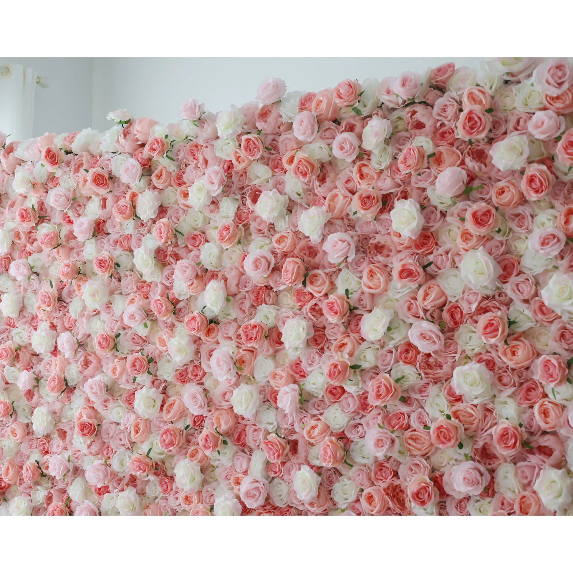 This flower wall features a soft blend of pink and white artificial roses. The dense, layered arrangement creates a gentle, romantic texture. Varying petal tones add depth, making it perfect for weddings or events. It exudes elegance and charm, serving as a dreamy backdrop for photos and decor. 
