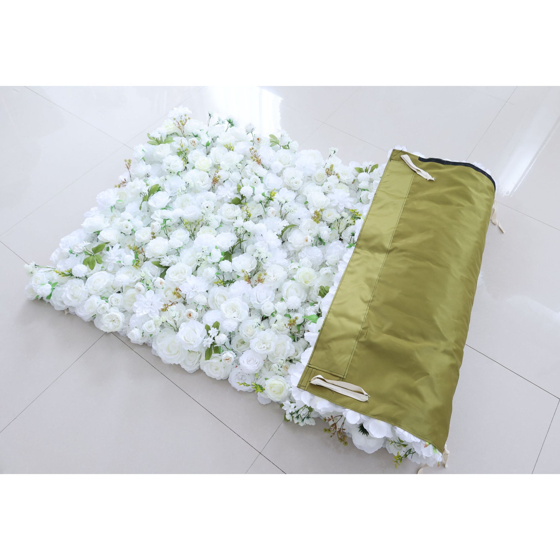 This backdrop features a rich arrangement of artificial white flowers, including roses and various small blooms, interspersed with green leaves. It comes with a storage bag, suggesting portability.

Suitable for weddings, symbolizing purity; corporate events, adding elegance; bridal and baby showers, enhancing a celebratory atmosphere; and photo - shoots for a beautiful background. 