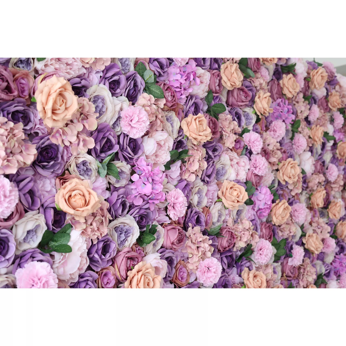 This flower wall features a dense arrangement of artificial flowers, including purple roses, peach - colored roses, pink carnations, and purple hydrangeas. The harmonious blend of colors creates a romantic and elegant atmosphere, making it suitable for decorative backdrops at events like weddings or photo shoots. 
