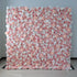 A large, square floral wall showcases a vibrant mix of pink, blush, and white artificial flowers. Dense clusters of roses, peonies, and smaller blooms create a lush, romantic display. Set against a plain light - colored wall with a tiled floor, it exudes elegance, perfect for weddings, photo backdrops, or upscale events needing a charming, floral focal point.