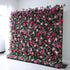 The arrangement features a beautiful combination of pink and white flowers. The flowers are meticulously arranged in an organized manner, creating an eye-catching display. The wall is adorned with various types of flowers, including roses, lilies, and other blooms, strategically placed to create a visually appealing design. 