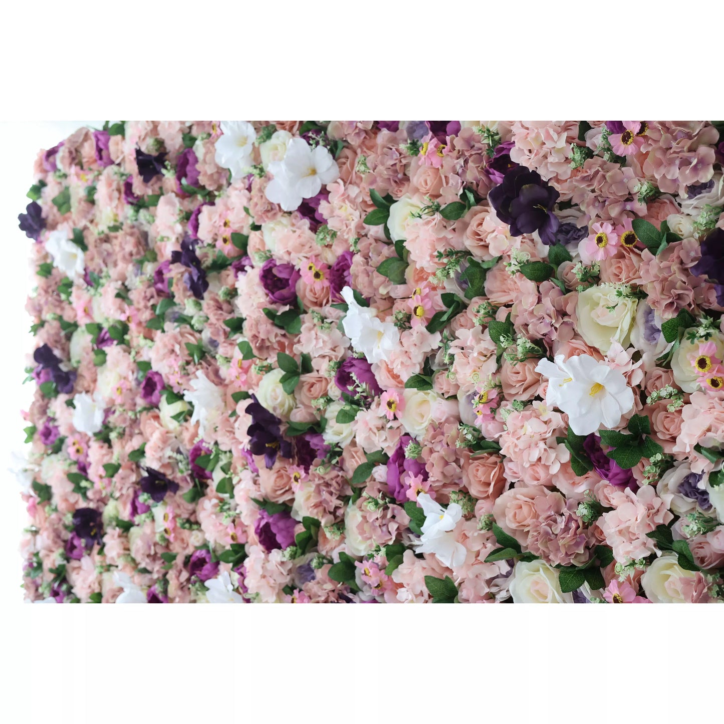 This intimate close-up showcases a lush, textured arrangement of artificial blooms in a romantic palette of blush, dusty rose, deep plum, and crisp white. It features hydrangeas, roses, pansies, and delicate filler flowers, layered with fresh-looking green leaves for a velvety, three-dimensional effect. The rich, vintage-inspired mix exudes warmth and elegance, making it a luxurious backdrop for weddings, photoshoots, or upscale events.