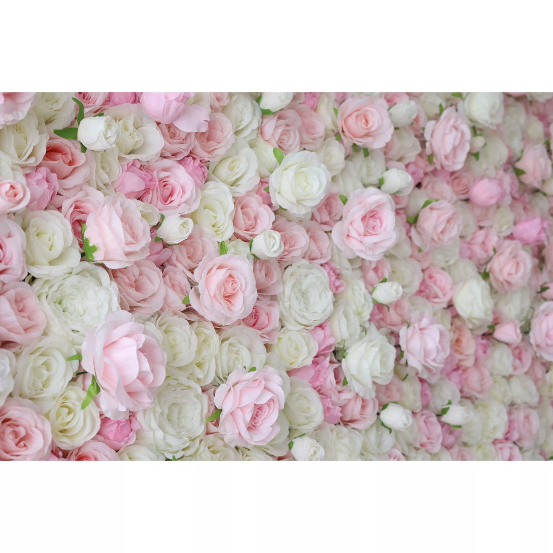 This is a close-up of a dense artificial flower wall, overflowing with a lush mix of soft pink, blush, and white roses and peonies. The tightly packed blooms create a romantic, textured, and dreamy display, ideal for wedding backdrops, photo shoots, or special event decor.