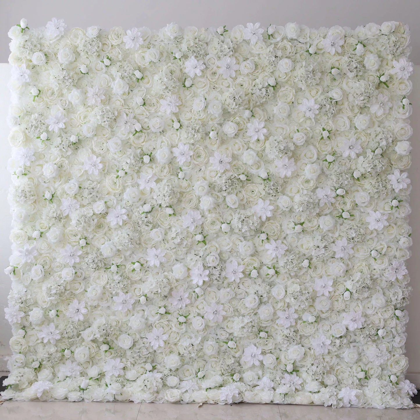 This flower wall is a lush, all - white display. It blends roses, delicate blooms, and textured foliage, creating a soft, elegant texture. Ideal for weddings or events, the monochromatic design exudes romance and sophistication, offering a dreamy backdrop for photos and decor. 