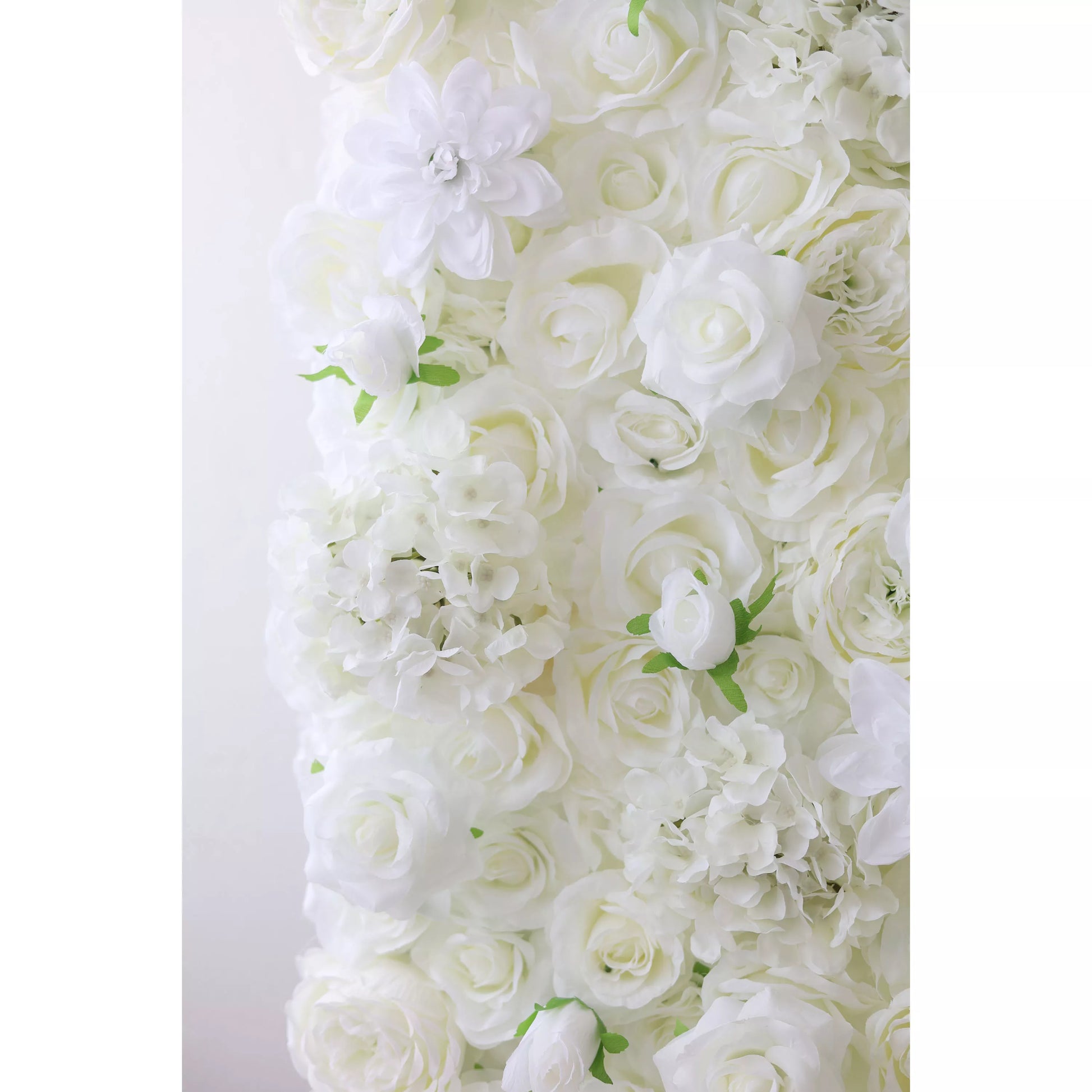 This flower wall is a lavish display of white artificial blooms. It blends roses, delicate flowers, and hydrangea - like blossoms, with tiny green leaves adding contrast. The dense, layered arrangement creates a soft, romantic texture, perfect for weddings or elegant events, exuding purity and sophistication. 