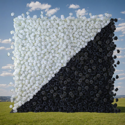 This photo showcases a striking floral wall by ValarFlowers, composed entirely of artificial roses. The wall is split diagonally into white and black sections, creating a bold, modern contrast. The uniform texture of the faux roses offers a polished, long - lasting display. Set against a backdrop of a grassy field and a partly cloudy sky, this design makes a dramatic statement. Ideal for avant - garde events, fashion shows, or contemporary decor, it adds a touch of high - contrast elegance